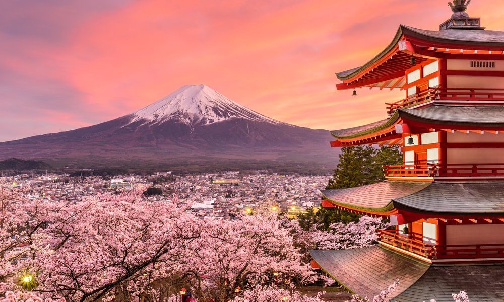 fujiyoshida japan at chureito pagoda and mt. fuji in the spring with cherry blossoms